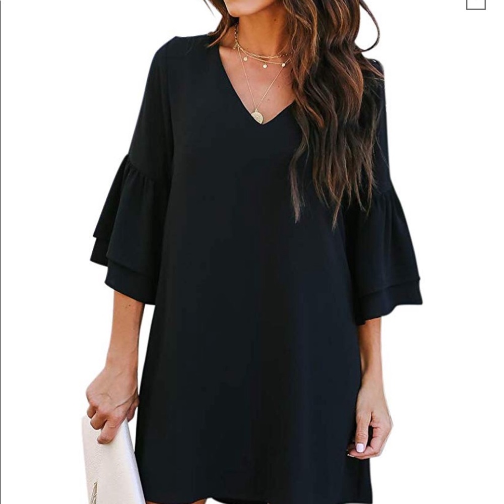 Very cute Black mini dress with ruffle sleeves.